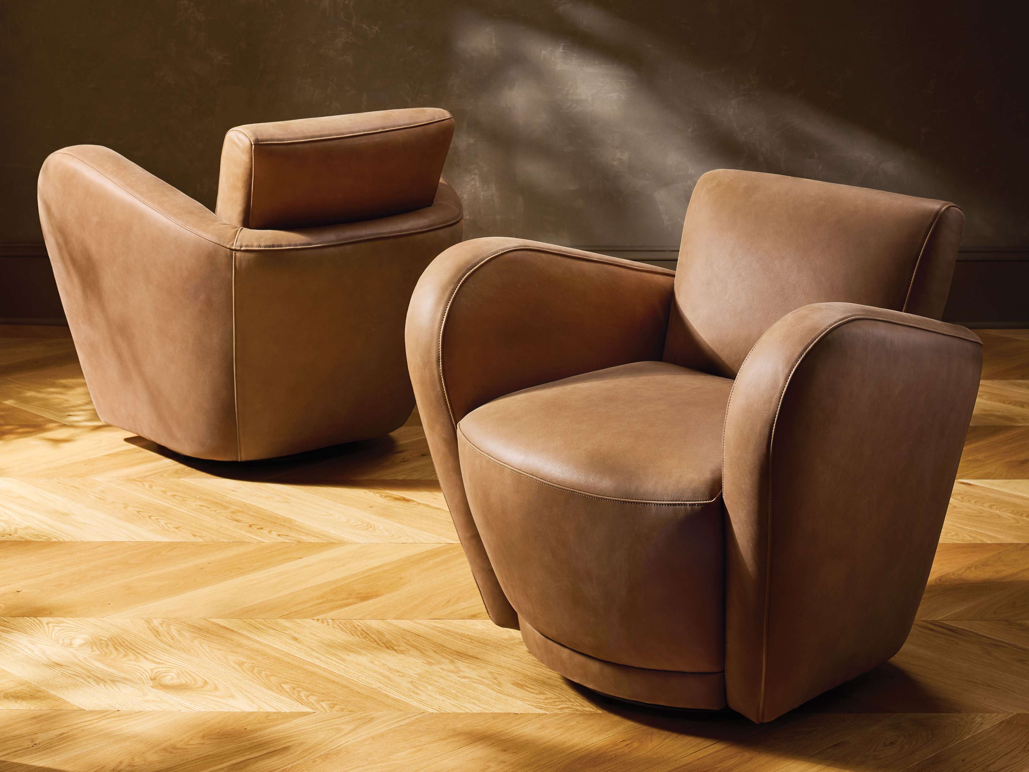 Fauteuil pivotant en cuir Amelia